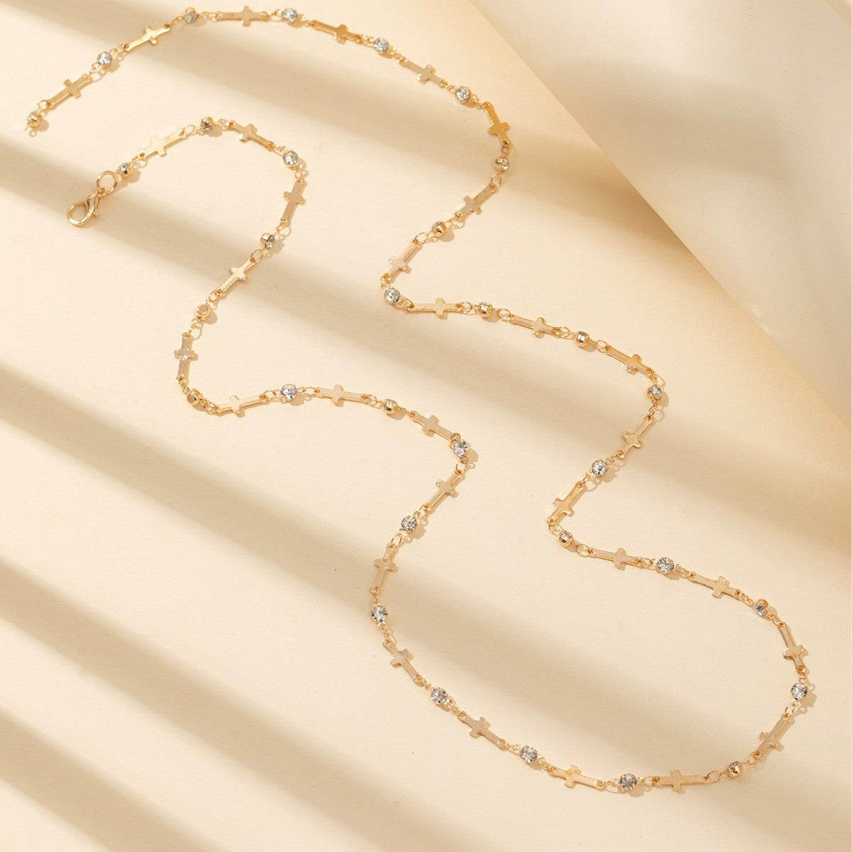 Long Y-Chain Necklace with Cross and Crystal Detail